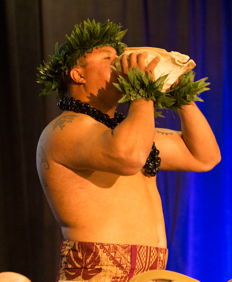 The ceremonial blowing of the conch shell